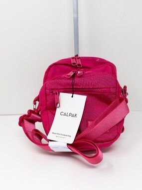 NEW Calpak Stevyn Mini Nylon Crossbody Water Bottle Holder Purse Bag Dragonfruit